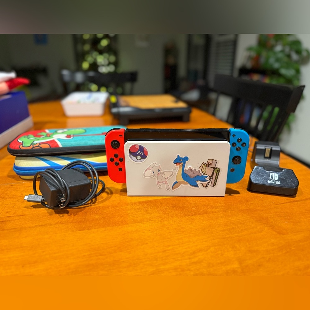 Nintendo Switch OLED with Red and Blue Joy-Con Controllers